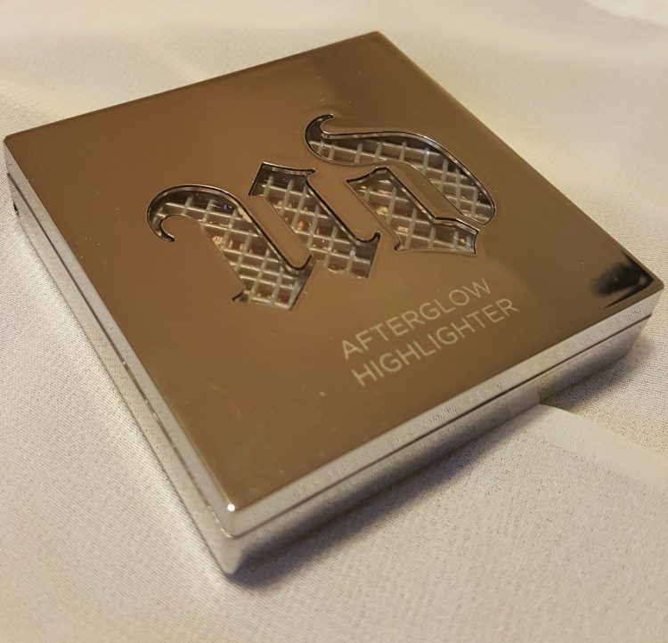 Urban Decay's Afterglow Highlighter in Sin #UrbanDecay #afterglow #highlight www.almostherblog.com